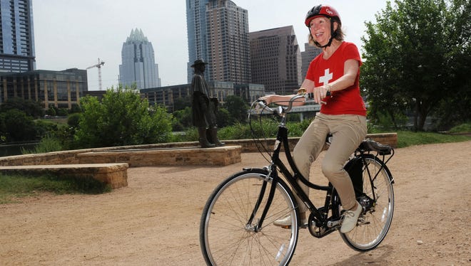 Bobbie Barker rides her bike July 26 in Austin. The USA will face an influx of aging Baby Boomers and elders.