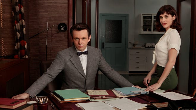 Michael Sheen plays Dr. William Masters and Lizzy Caplan is Virginia Johnson.