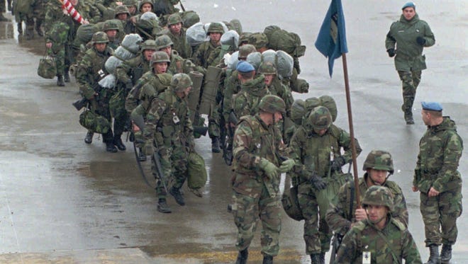 Marines arrive in Sarajevo, Bosnia, in December 1995.