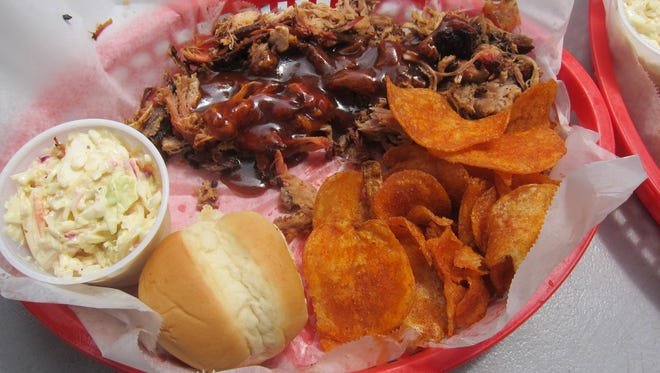 A pulled pork platter with Central's excellent barbecue sauce, homemade potato chips and coleslaw.
