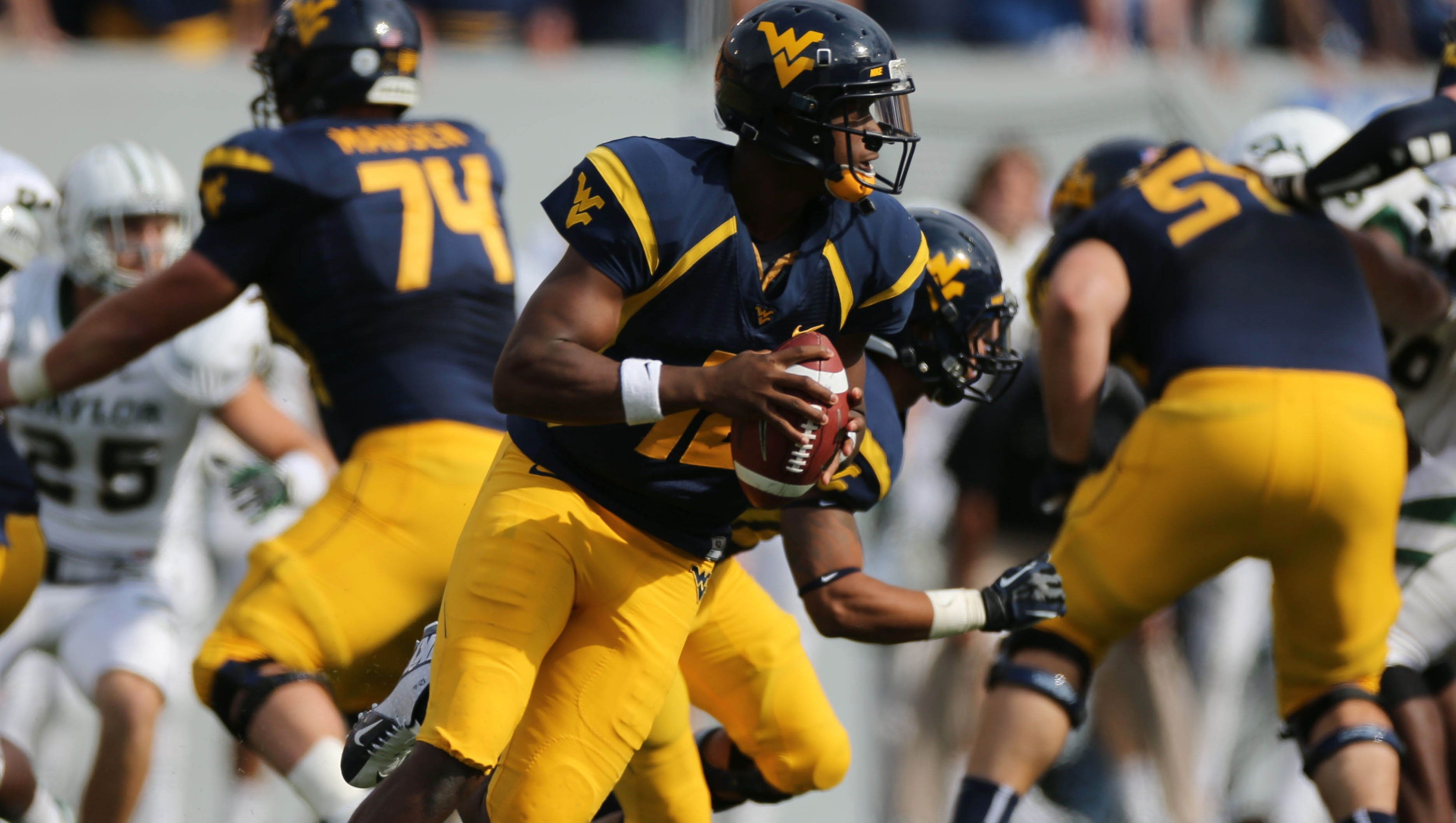 No 9 West Virginia Outscores Baylor In Wild 70 63 Win