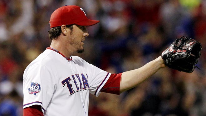 Joe Nathan reacts to the final out of the second game of a doubleheader against the Angels.