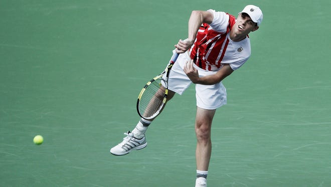 Sam Querrey of the USA fires a serve during his straight-sets victory Monday against Zhe Li of China in the first round of the Shanghai Rolex Masters.