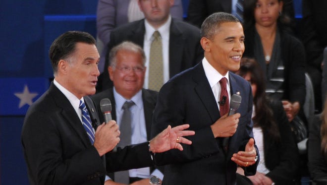 Mitt Romney and President Obama debate in Hempstead, N.Y., on Tuesday.