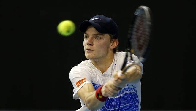 David Goffin of Belgium lines up a backhand during his victory Wednesday against John Isner of the USA.