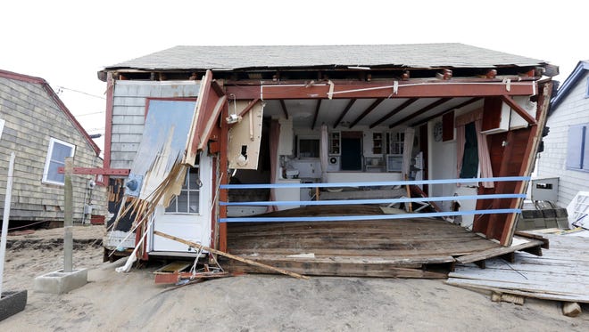 The front of a cottage at Roy Carpenter's Beach was torn away in South Kingstown, RI.
