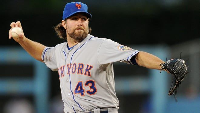 The Mets' R.A. Dickey won 20 games and led the National League with 230 strikeouts in 2012.