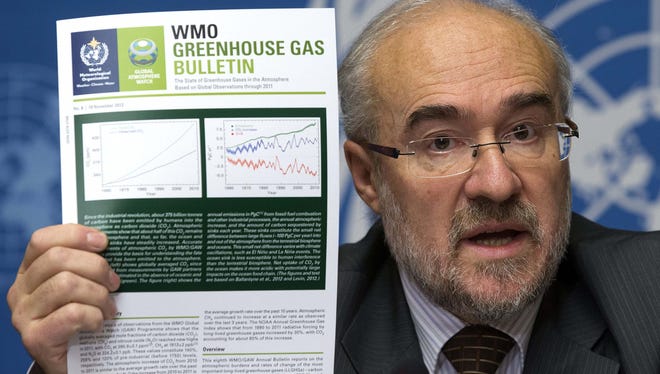 Michel Jarraud, Secretary-General of World Meteorological Organization informs the media about greenhouse gases in the atmosphere, during a press conference in Geneva, Switzerland, on Tuesday.