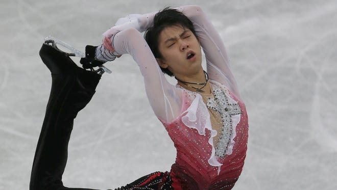 Yuzuru Hanyu of Japan performs during the men's free at the ISU Grand Prix of Figure Skating in Sendai, Japan, on Saturday. He won the competition by 10 points.
