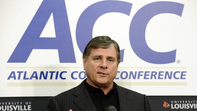 Louisville athletic director Tom Jurich address reporters during a news conference, Wednesday, Nov. 28, 2012, in Louisville, Ky. The Atlantic Coast Conference announced Wednesday that its presidents and chancellors unanimously voted to add Louisville as the replacement for Maryland.