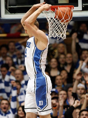 Duke 73, Ohio State 68: Blue Devils forward Mason Plumlee dunks against the Buckeyes during the first half at Cameron Indoor Stadium.