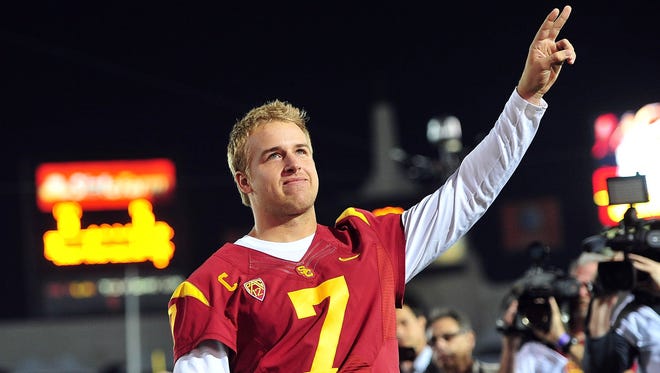 Southern California Trojans quarterback Matt Barkley (7) acknowledges the crowd before the Trojans play against the Notre Dame Fighting Irish at the Los Angeles Memorial Coliseum.