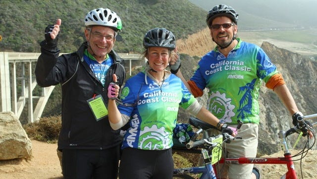 Tracie Seimon bikes with her doctor, John Hardin, left, and her husband, Anton Seimon.