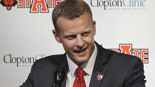 Two years after leaving Boise State, Bryan Harsin was hired as coach of Arkansas State.