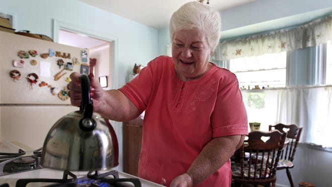 Retiree Marge Youngs in her home in Toledo, Ohio.