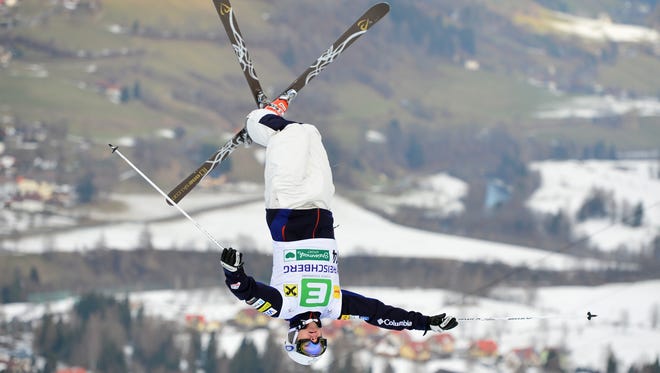 Bryon Wilson of the United States jumps during the men's freestyle World Cup dual moguls skiing competition in Kreischberg, Austrian province of Styria. Wilson won the competition.