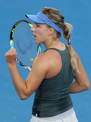 Ksenia Pervak celebrates a point in her upset win over Caroline Wozniacki.