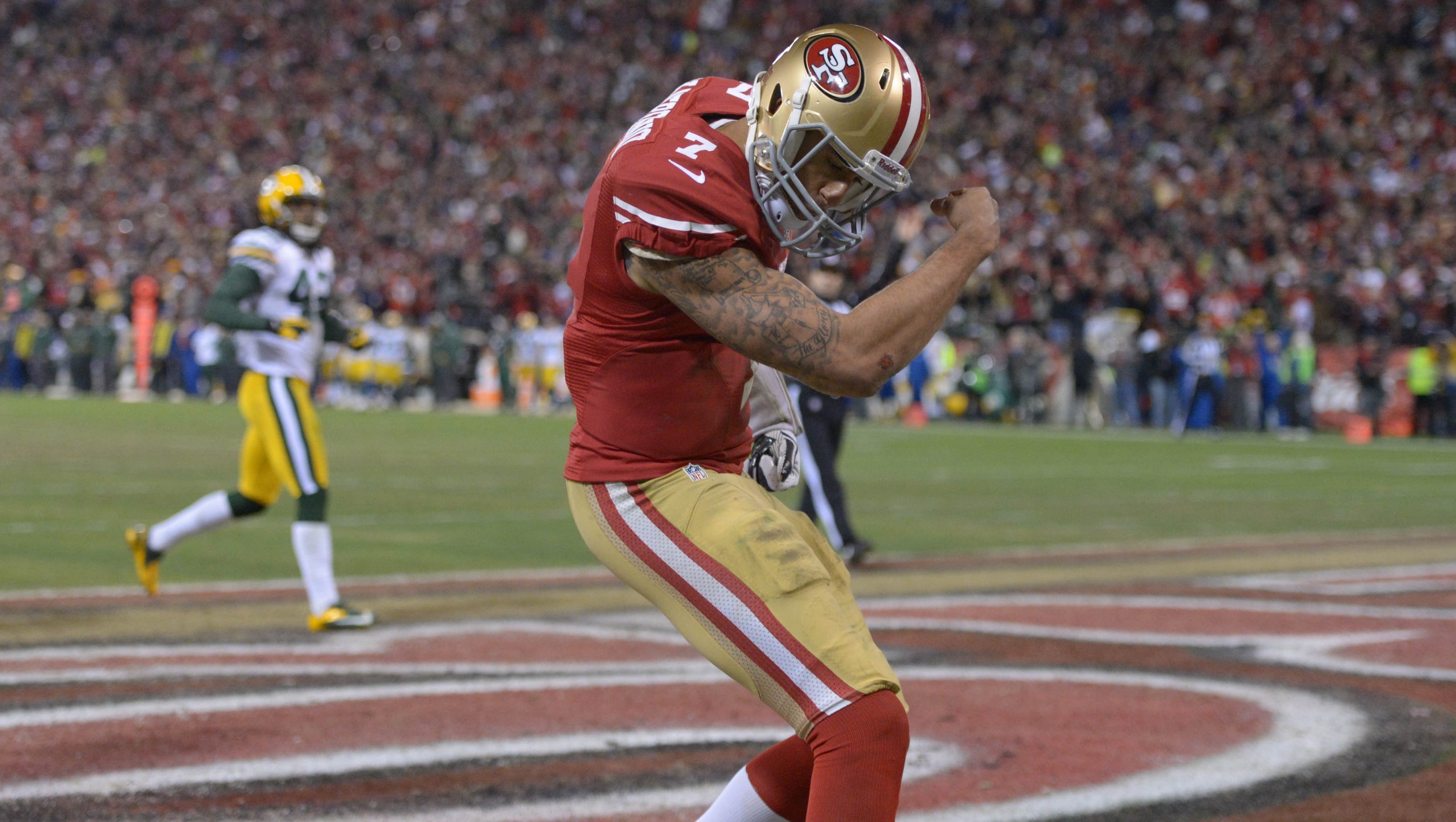 Colin Kapernick celebrates a touchdown run against the Packers in the 2012 Playoffs.