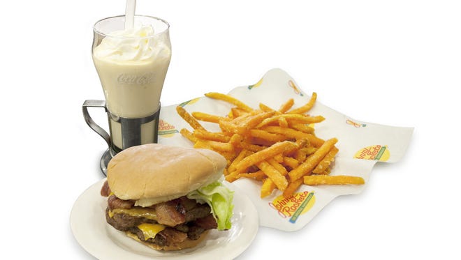 Johnny Rocket?s' Big Apple Shake, bacon cheddar double burger and sweet potato fries add up to 3,500 calories.