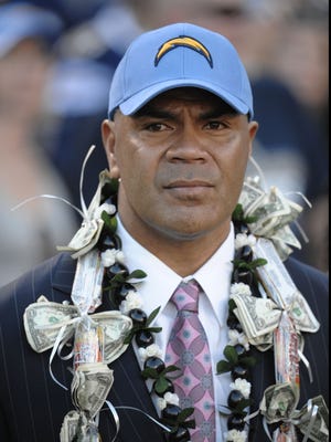ORG XMIT: SEAU89.JPG FILE--San Diego Chargers former player Junior Seau during his induction into the San Diego Chargers Hall of Fame in a ceremony held at half time of an NFL football game against the Denver Broncos Sunday, Nov. 27, 2011 in San Diego.  (AP Photo/Denis Poroy)