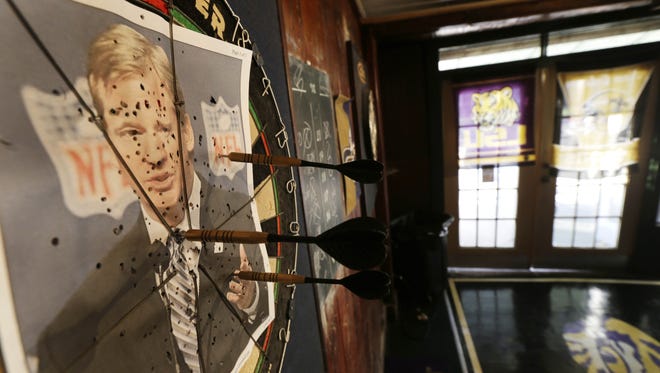 A photo of NFL commissioner Roger Goodell is seen on a dartboard inside the Parkview Tavern in New Orleans Jan. 25, 2013.