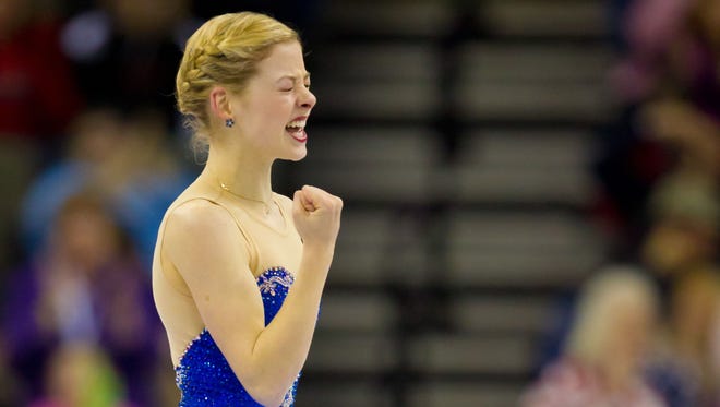 Gracie Gold reacts after her free skate at the U.S. Figure Skating Championships in Omaha on Saturday. Gold came from ninth place in the short program to win silver.