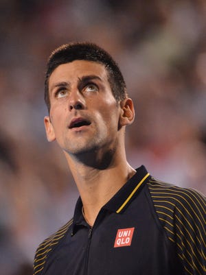 Novak Djokovic is a four-time Australian Open champ. The one major he's missing is the French Open.