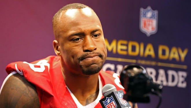 Vernon Davis is happy to be playing (and dressing) alongside Randy Moss.