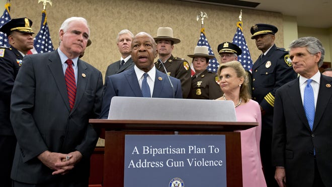 A bipartisan group of lawmakers announce the introduction of a bill in the House of Representatives on Tuesday to make firearms trafficking a federal crime.
