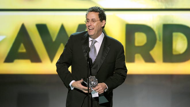 Writer Tony Kushner accepts the Best Adapted Screenplay Award for 'Lincoln' onstage at the 18th Annual Critics' Choice Movie Awards on Jan. 10 in Santa Monica.