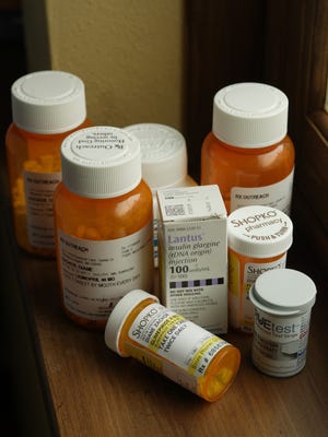 A variety of prescription drugs are shown in this file photo. The overall rise in prices defies the trend of other health costs declining.
