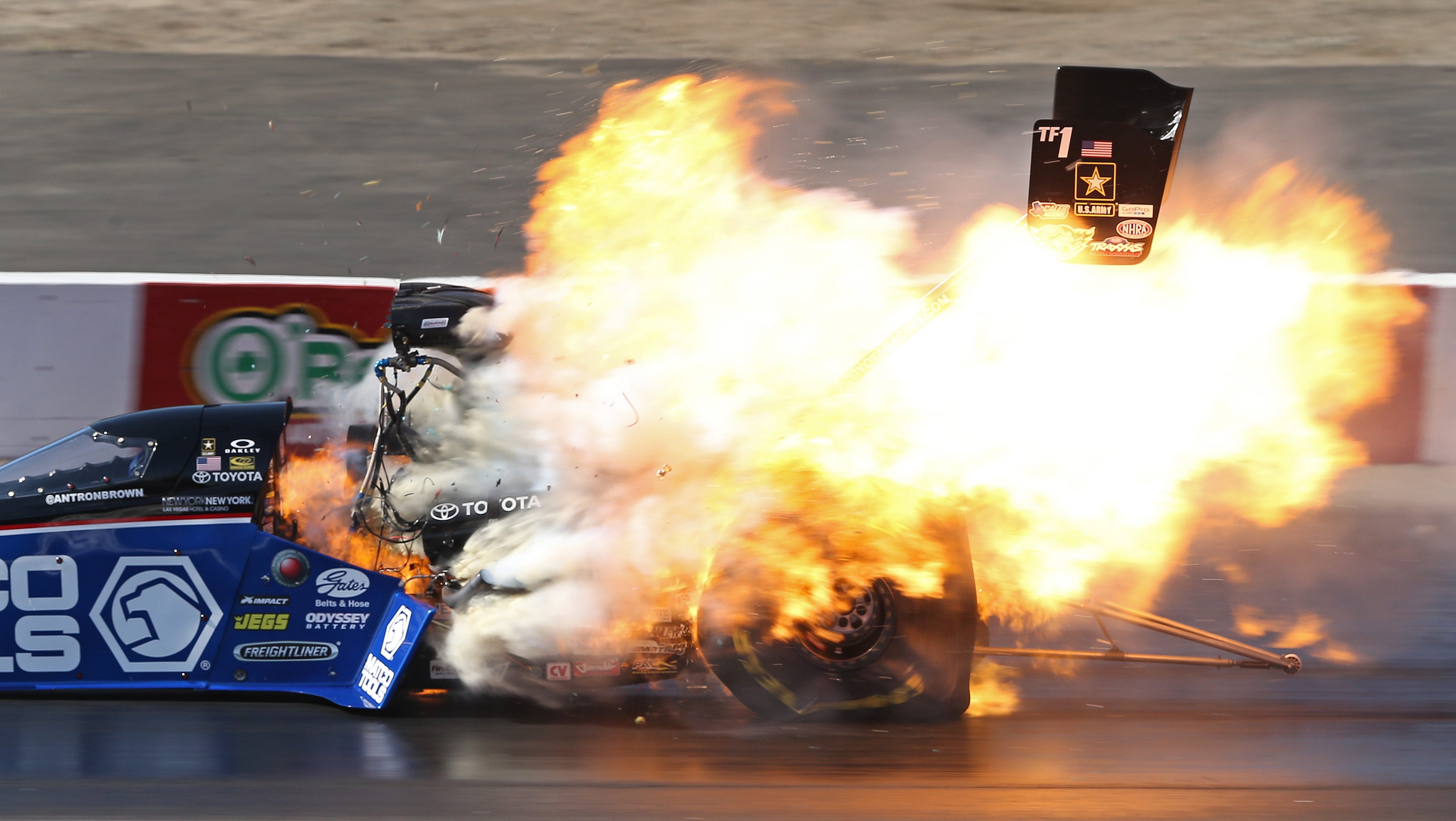 Top Fuel champ survives fiery crash at NHRA opener