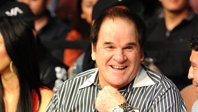 Pete Rose, shown here in 2012, says he's irked that Topps "quietly deleted any reference on its cards to my accomplishments."