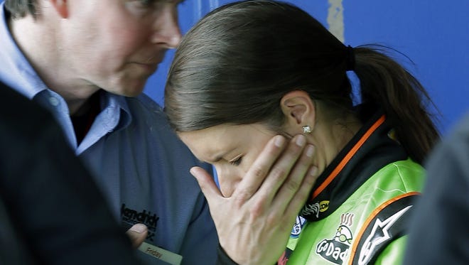 Danica Patrick appears upset after she drove her car to the garage instead of stopping on pit road.