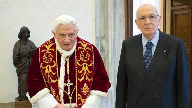 Pope Benedict XVI receives Italian President Giorgio Napolitano at his private library on Saturday in Vatican City.