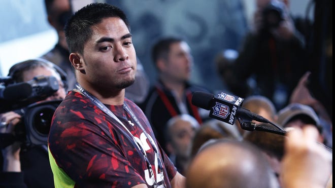 Former Notre Dame linebacker Manti Te'o  speaks to the news media during the 2013 NFL scouting combine Feb. 23 at Lucas Oil Stadium in Indianapolis.