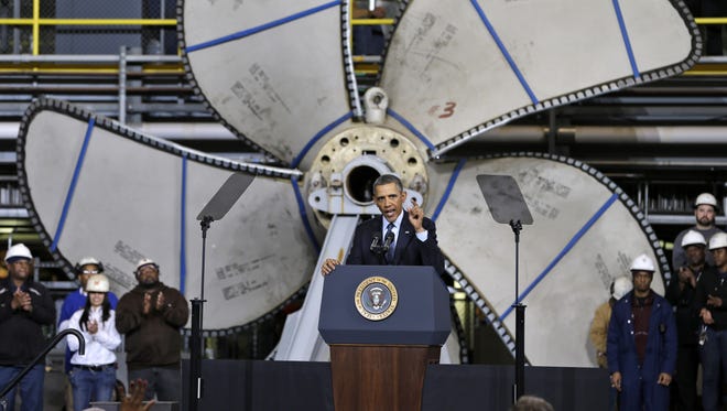 President Obama speaks Tuesday about automatic defense budget cuts at Newport News Shipbuilding in Newport News, Va.