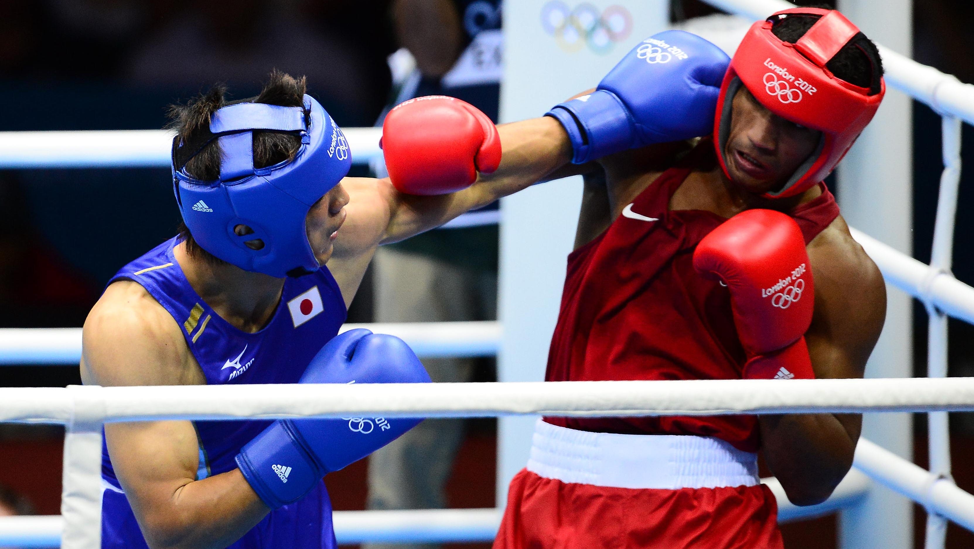 Olympic boxing drops head guards
