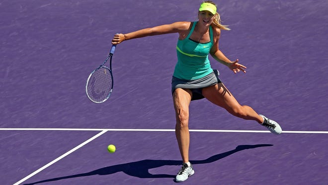 Maria Sharapova of Russia moves forward during her 7-5, 7-5 victory Wednesday against Sara Errani of Italy during in Key Biscayne, Fla.