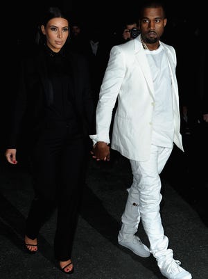 Kim Kardashian and Kanye West are expecting a baby this summer.