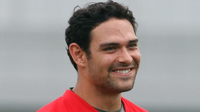 New York Jets quarterback Mark Sanchez, shown during minicamp in 2012, is working with former Pro Bowl  quarterback Jeff Garcia to learn new offensive coordinator Marty Mornhinweg's playbook.