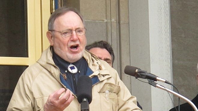Rep. Don Young, R-Alaska, speaks Thursday outside the state Capitol in Juneau.