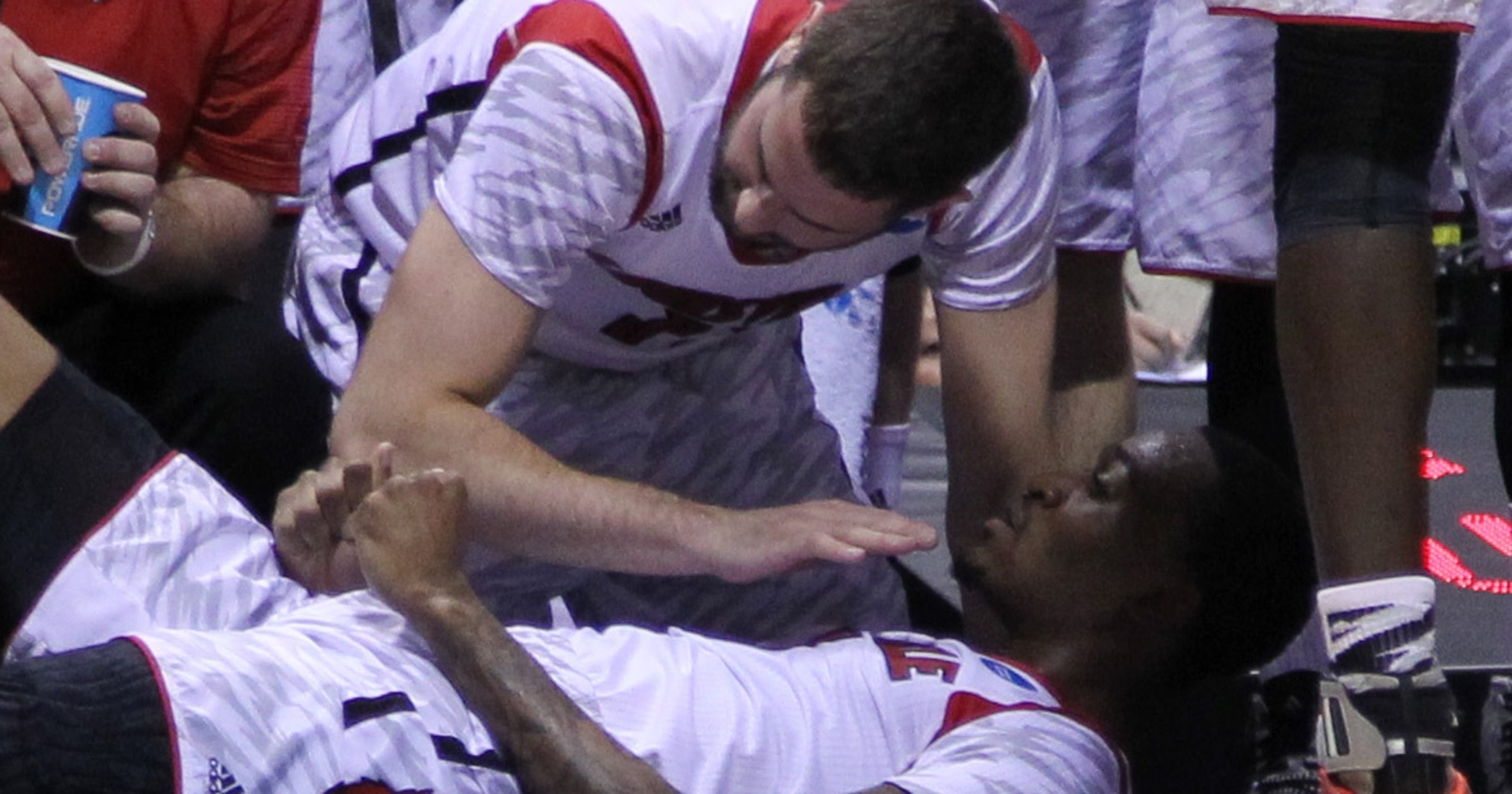 louisville basketball player fractured leg Kevin Ware on Louisville teammate that 'touched my heart'
