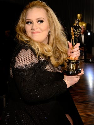 She may be a Grammy and Oscar winner, but singer Adele says she's not yet ready to write a memoir.
