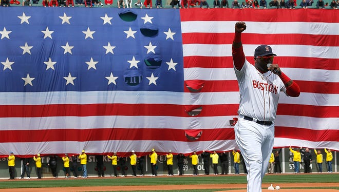 David Ortiz delivers a pregame speech to the fans at Fenway Park.
