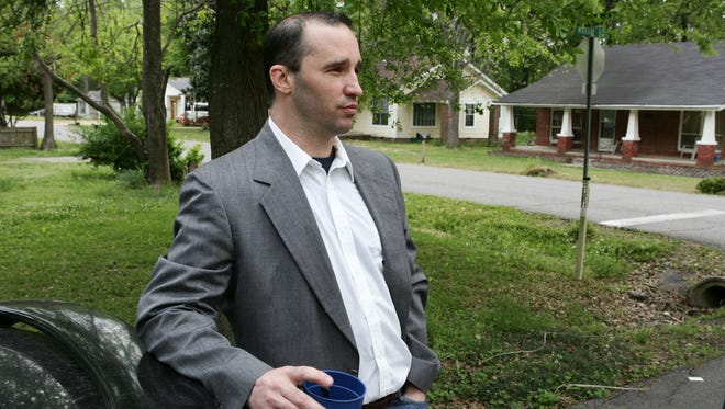 Everett Dutschke stands in the street near his home in Tupelo, Miss., on April 23.