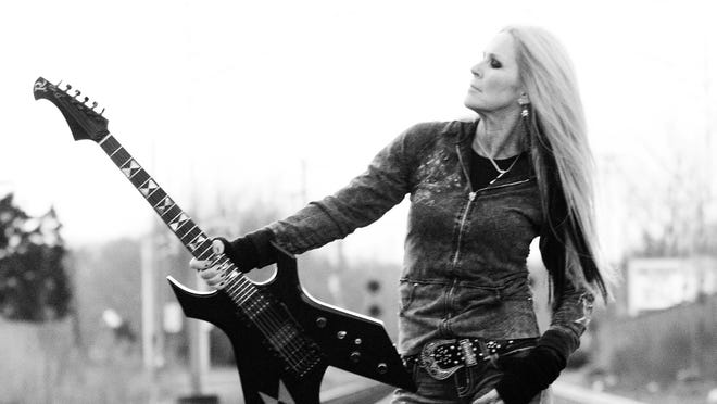 Lita Ford is premiering her new video, "Mother," at USA TODAY.