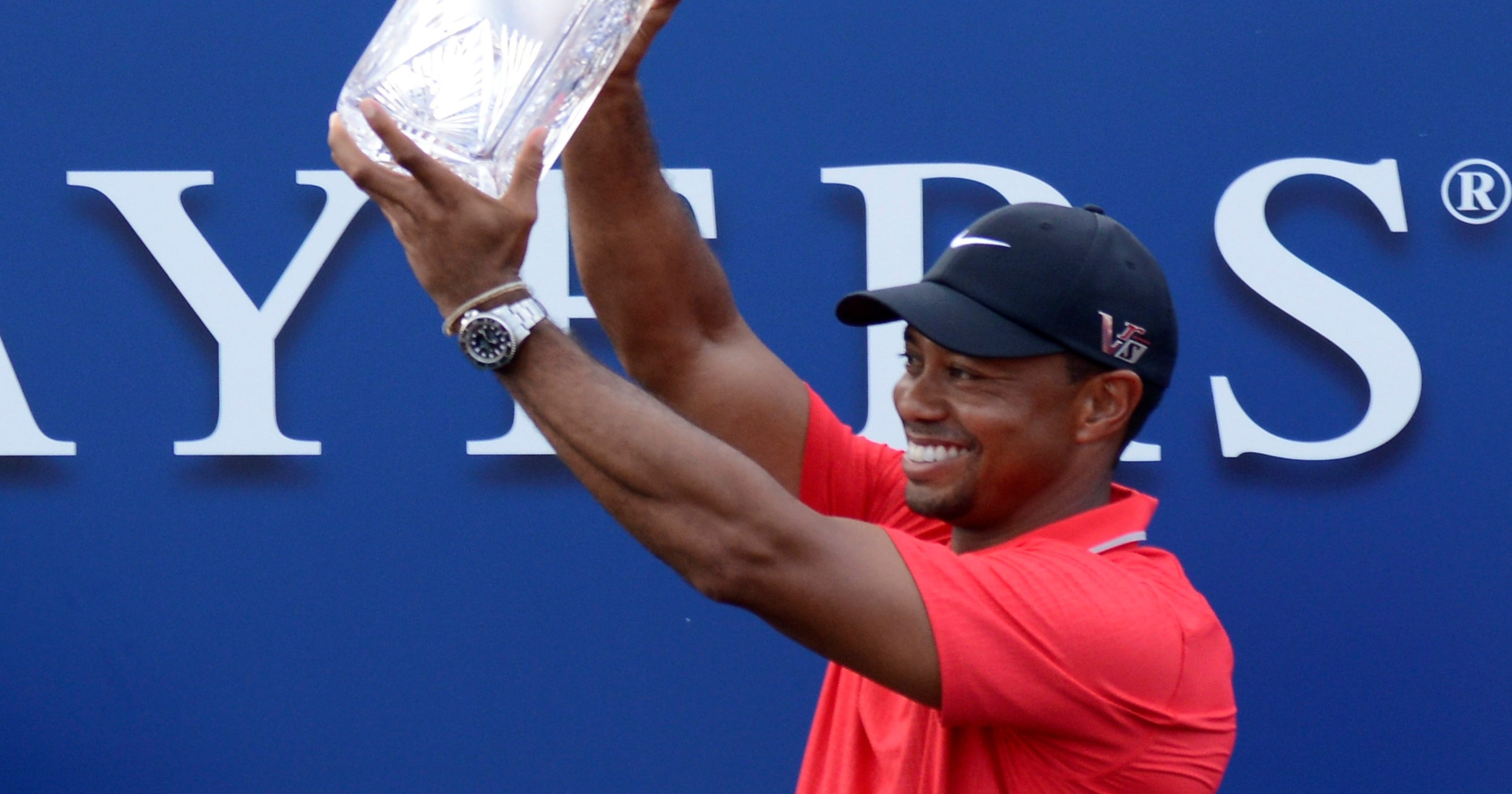 Tiger Woods hangs on to win The Players Championship