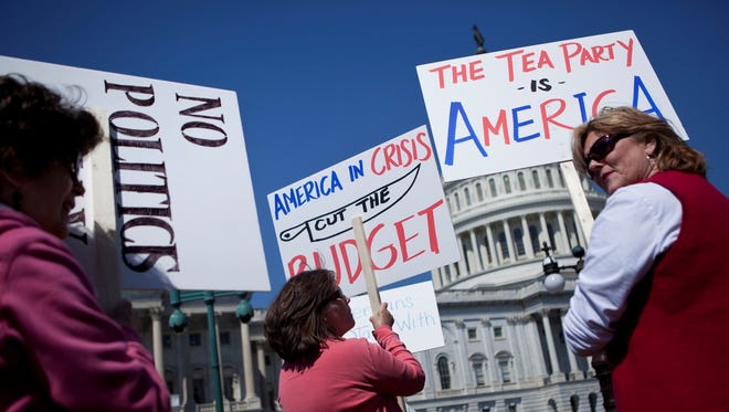 File photo:  Tea Party activists gather on Capitol Hill April 6, 2011 in Washington, DC.
