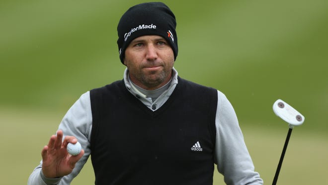 Sergio Garcia acknowledges the applause on the 18th hole during the second round of the BMW PGA Championship.